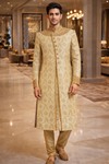 Sherwani mariage crème brodé doré