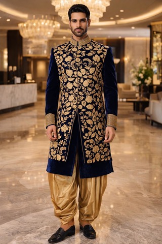 Traje indo occidental azul marino elegante