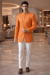 Traje indo western naranja con parches