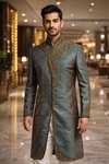 Indischer Hochzeitsdesigner-Sherwani in Türkisgrün